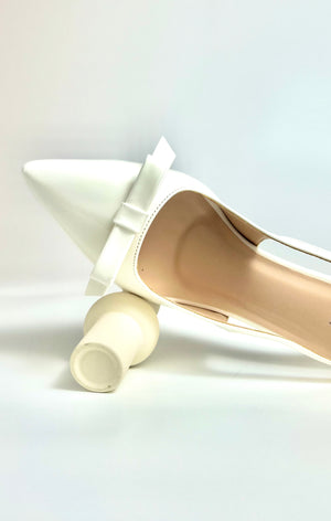 The Neutral Note – White Mules